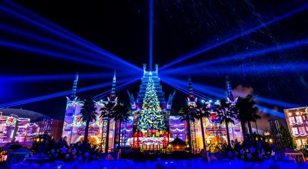Gleaming building and twinkling trees at Disney World, the perfect setting after Jingle Bell Jingle BAM or a Dessert Party.