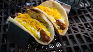 Sausage, egg & cheddar breakfast tacos on flatbread in metal stands—straight from Star Wars: Galaxy’s Edge at Disney’s Hollywood Studios.
