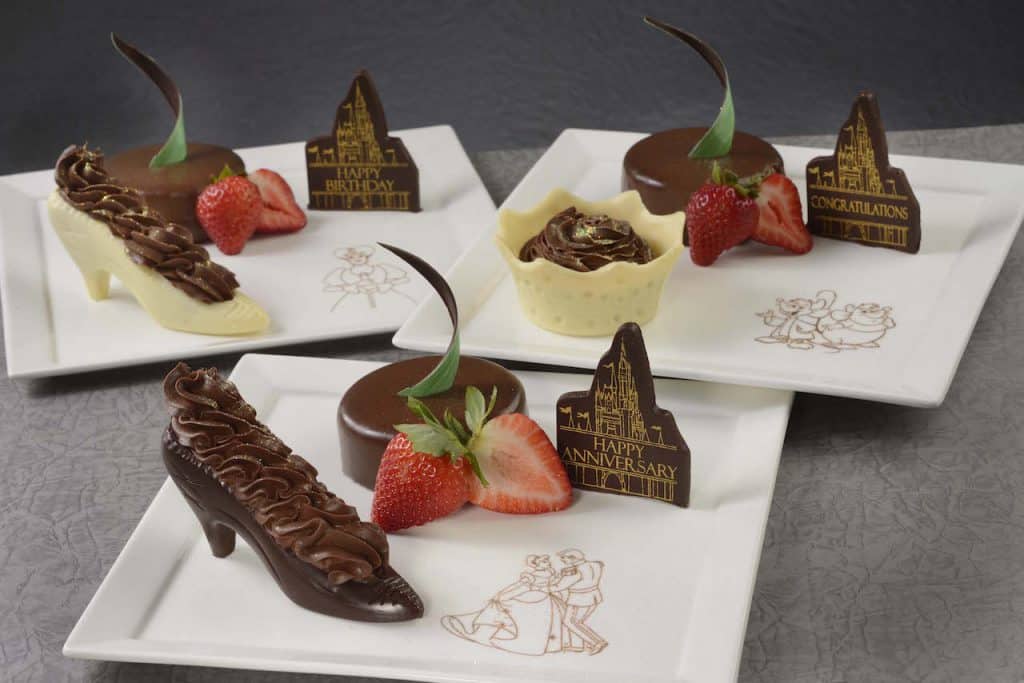 Savor December 2019’s Disney Parks treats—chocolate desserts, strawberries, chocolate heels, and fun chocolate messages.