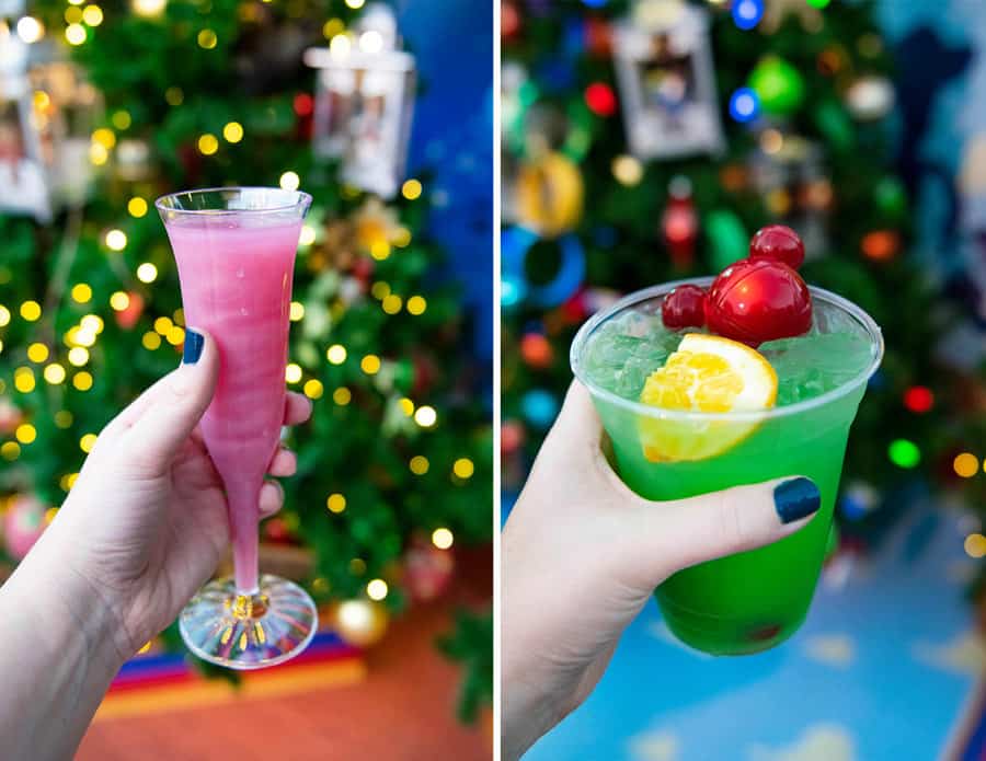 Sip festive drinks—pink fizz in a flute and a green cocktail—by the Christmas tree at Disney Springs Christmas Tree Trail.