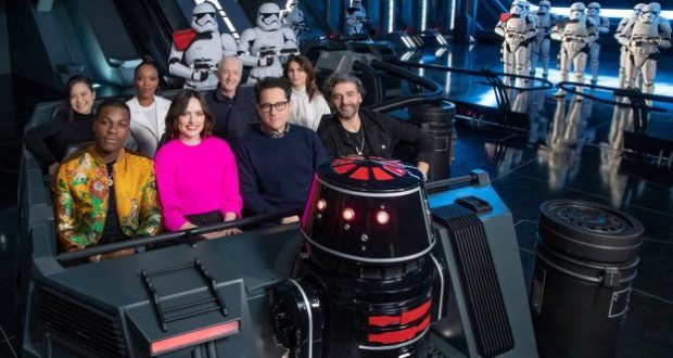 Guests experience Star Wars: Rise of the Resistance, riding past lines of First Order Stormtroopers inside the attraction.