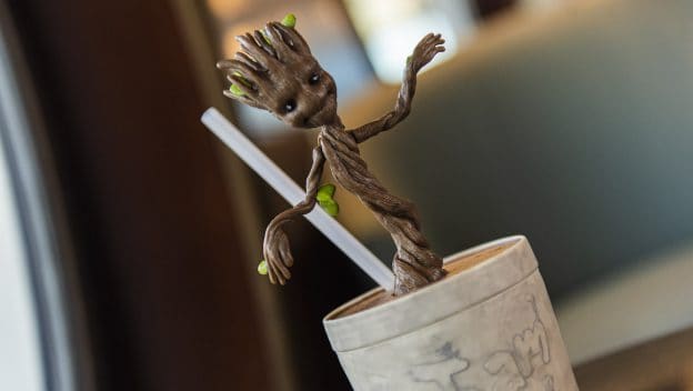 Groot in a themed drink cup with straw, playfully ready for Marvel Day at Sea—an epic collectible for Disney Cruise fans.