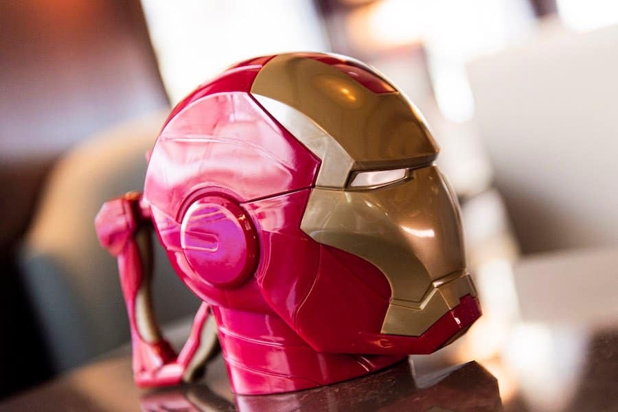 Iron Man’s iconic red and gold helmet displayed indoors during Marvel Day at Sea—ideal for your Heroic Drinkware collection.