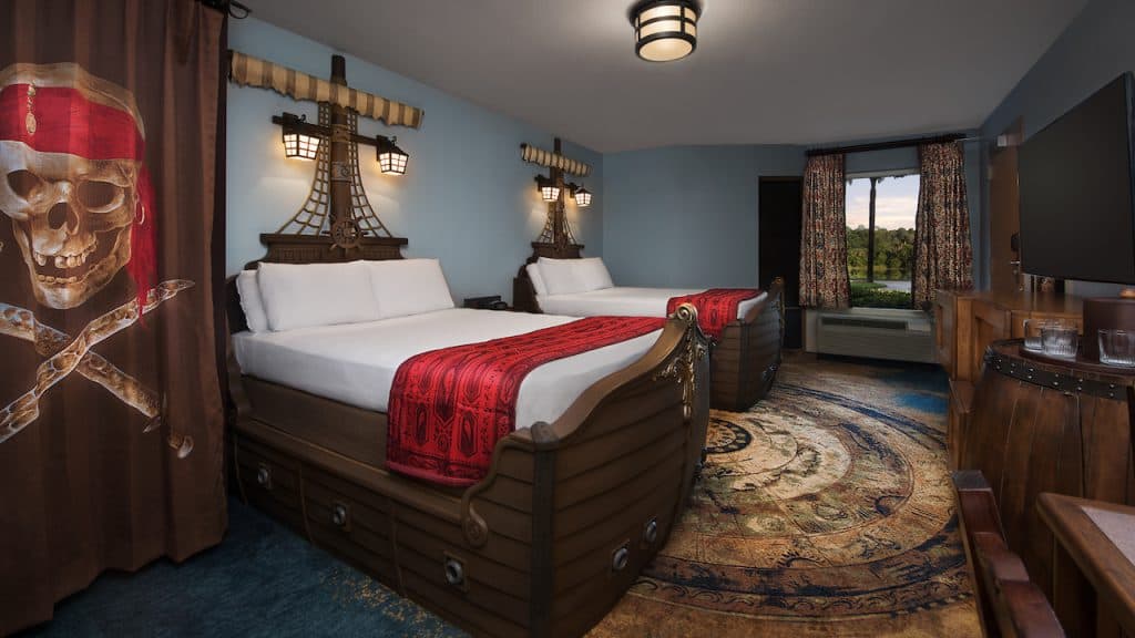 Pirate-themed room with two beds, designed for young Disney fans ready for adventure and magical moments at the parks.