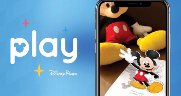 Mickey Mouse animated on a smartphone with "play" and Play Disney Parks App logo, set against a vibrant Disney Parks blue backdrop.