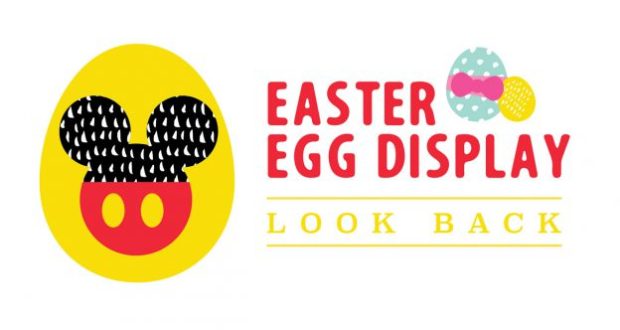 Mickey-shaped yellow Easter egg and colorful decorated eggs with "Easter Egg Display Look Back" at Walt Disney World.