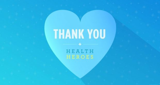 Blue backdrop with a big heart reading "Thank You Health Heroes" in white and yellow, honoring healthcare heroes like Disney magic.