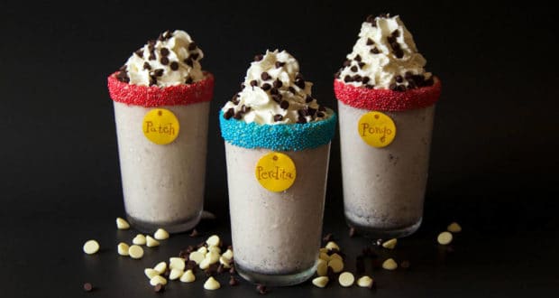 Chocolate Chip Shakes with whipped cream and chips in sprinkle-rimmed Patch, Perdita, and Pongo glasses—101 Dalmatians magic!.
