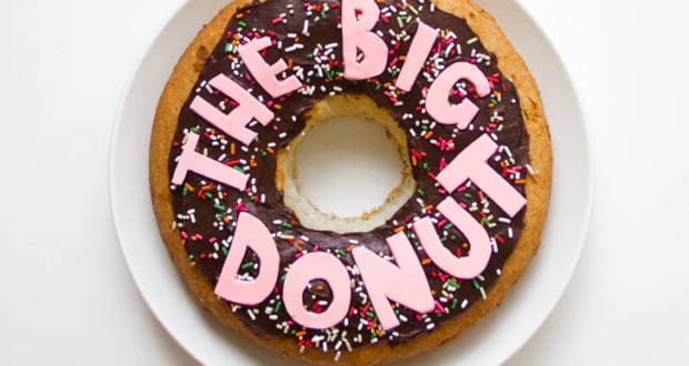 The Big Donut from Zootopia—giant, chocolate-frosted with sprinkles and pink letters, just like you’d find at Disney Parks.