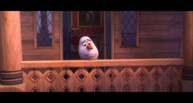 Olaf looks sad on a wooden balcony outside his house, recreating the touching "I Am With You" moment from At Home with Olaf.