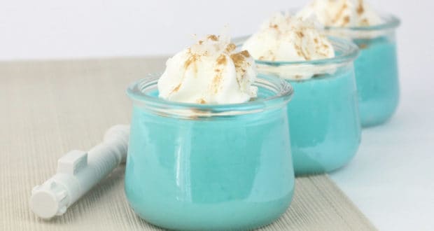 Blue Milk Pudding served in Star Wars: Galaxy’s Edge—three glass jars with whipped cream and cinnamon, ready for fans.