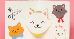 Aristocats-themed pop-up card, featuring cat faces, "Je t'aime," and a pink backdrop—ideal Disneyland Mother’s Day souvenir.