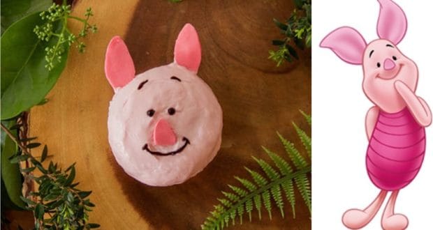 Piglet-themed donut alongside Piglet artwork on rustic wood, perfect for Disney dessert fans seeking Pooh-inspired treats.