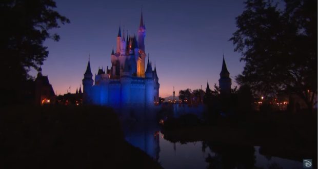 Cinderella Castle aglow at dusk in Magic Kingdom, purple sky and shimmering reflection evoking Disney’s iconic enchantment.
