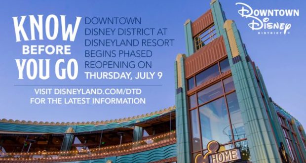 Downtown Disney’s entrance welcomes guests back July 9, highlighted by reopening banners beneath a clear blue sky.