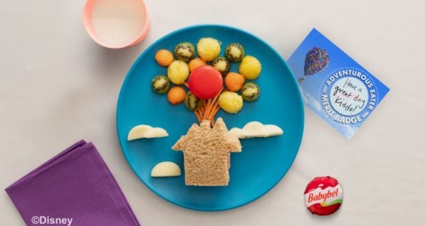 An Up-inspired house sandwich and fruit balloon plate, just like in Disney parks, with milk and cheese on the side.