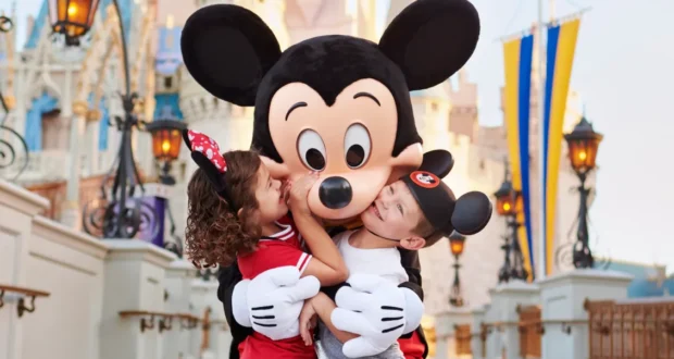 mickey mouse hugging kids