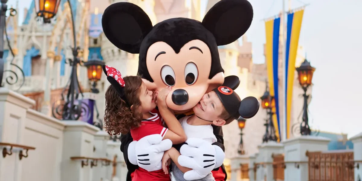 mickey mouse hugging kids