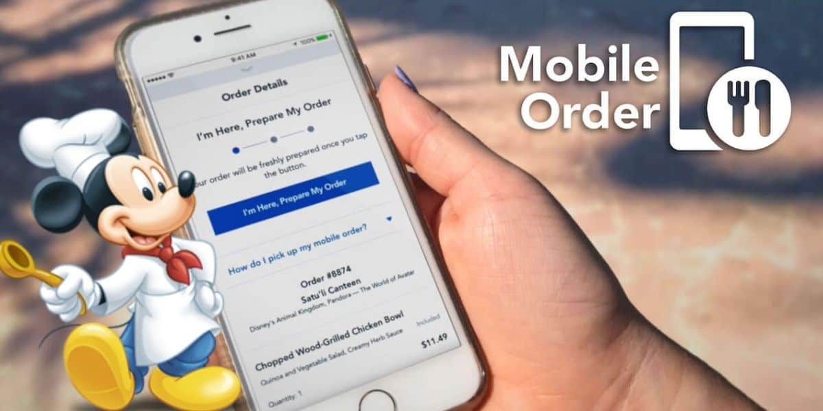 A hand holds a smartphone displaying the My Disney Experience App, where a food ordering interface is visible. Mickey Mouse, dressed as a chef, points with a wooden spoon. To the right, "Mobile Order" appears next to a stylized fork and spoon icon.