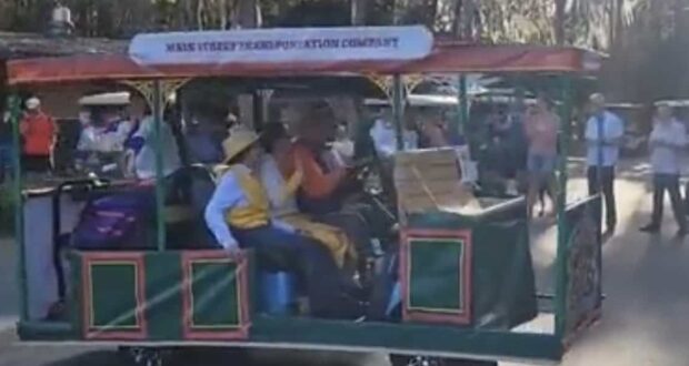 The Main Street Transportation Company trolley rolls down Main Street, delighting guests amid the magic of Disney World.
