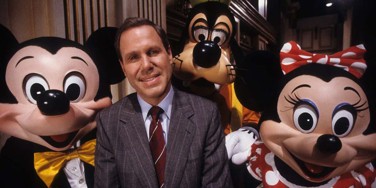 Michael Eisner with Disney characters