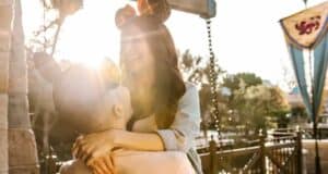 Couple at Disney enjoys the parks.