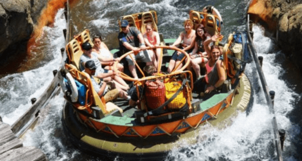 Folks Getting Soaked on Kali River Rapids Attraction