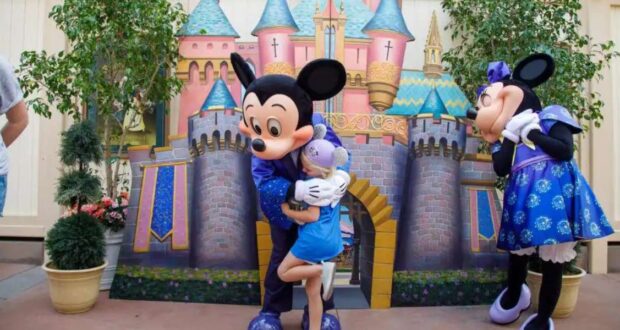Make a Wish Kid Hugs Mickey at Disneyland