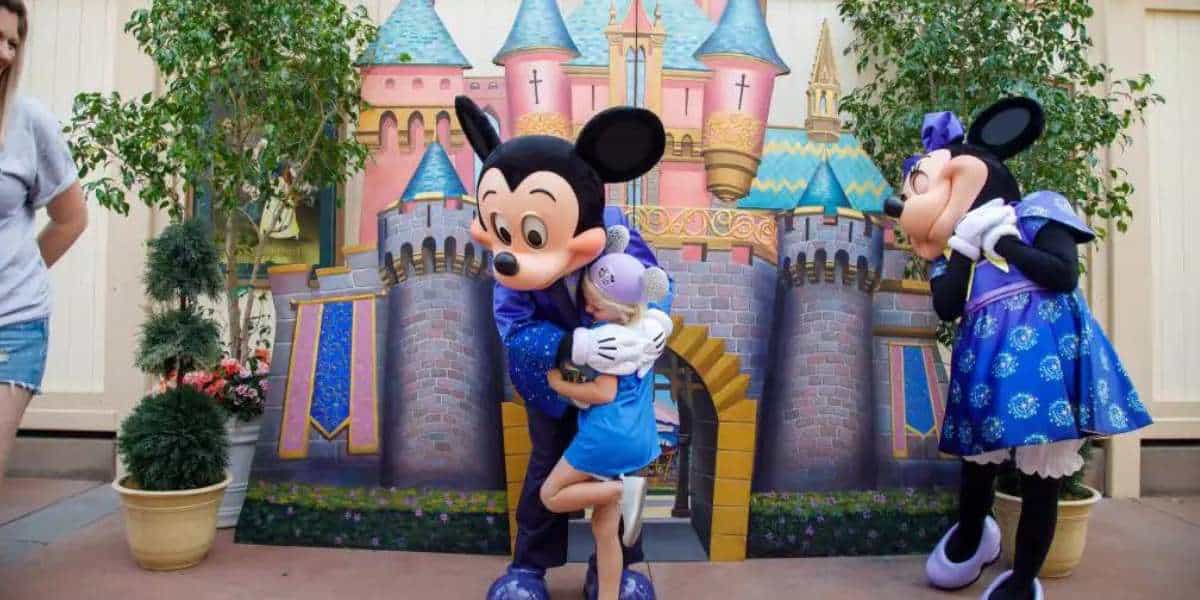 Make a Wish Kid Hugs Mickey at Disneyland