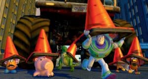Toy Story toys running across street under cones