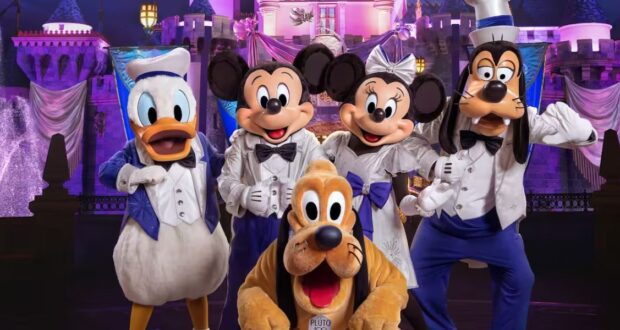 Mickey and Friends in front of Sleeping Beauty Castle at Disneyland Park
