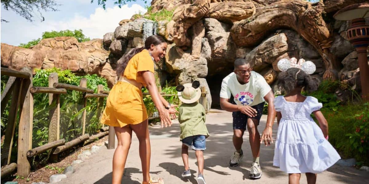 Disney World guests by the Tree of Life at Animal Kingdom