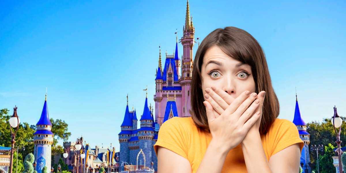 Shocked woman in front of Disney World