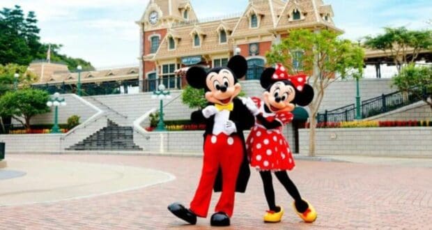 Mickey and Minnie outside Disney train station