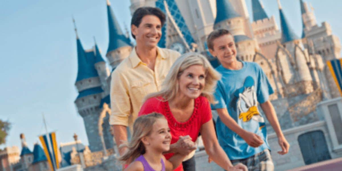 Disney Family reaching for a hug at Walt Disney World