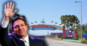 Ron DeSantis in front of Walt Disney World Sign