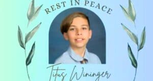 A memorial image with a photo of a young boy wearing a light blue shirt and tie, framed by decorative leaves on both sides. Text above the photo reads "Rest in Peace," and the name "Titus Wininger, 11 year old dies at Wild River Water Park in Irvine California," is written below in cursive.