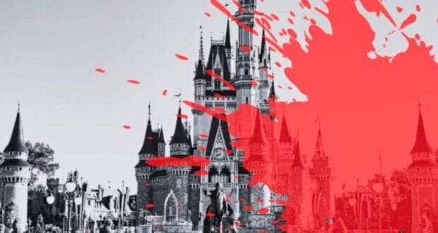 Black and white image of Disney World's castle with a splattered bright red paint effect on the right side, creating a stark, artistic contrast.