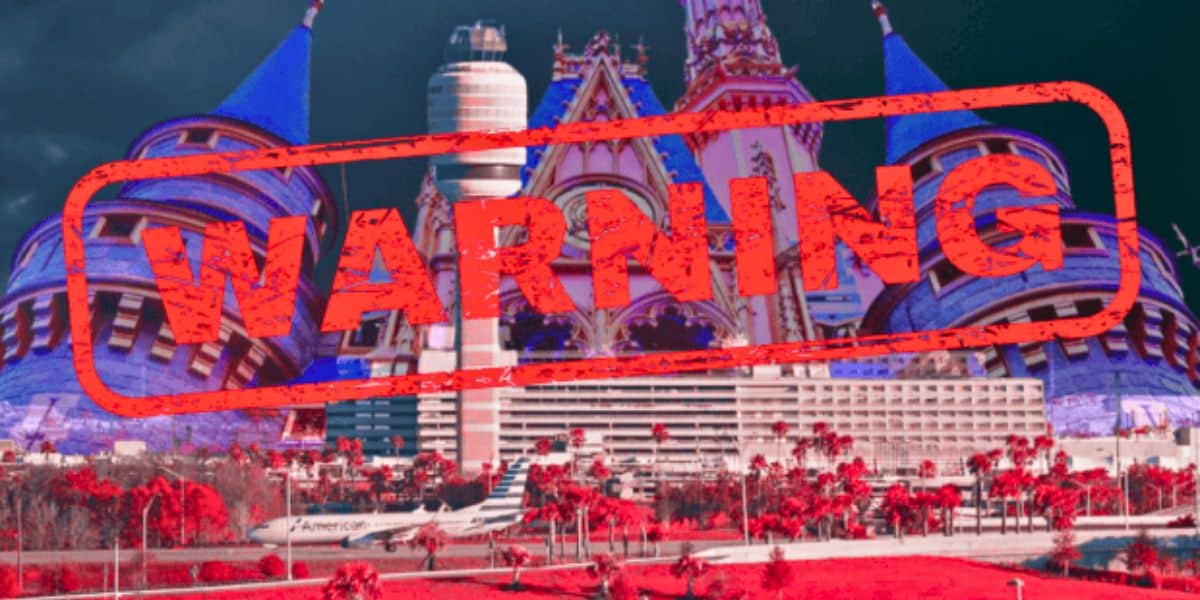 Image of a castle with vibrant, exaggerated colors and a dark, ominous sky. The word "WARNING" is prominently stamped in red across the castle, creating a sense of urgency or danger.