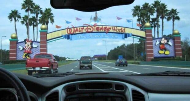 The entrance to Walt Disney World Resort in Central Florida as seen through a car window