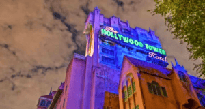 Tower of Terror lit up on a cloudy night