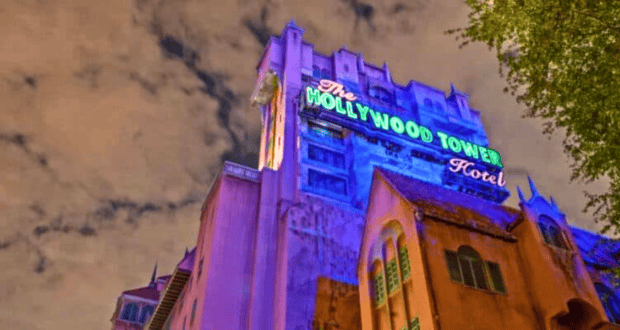 Tower of Terror lit up on a cloudy night