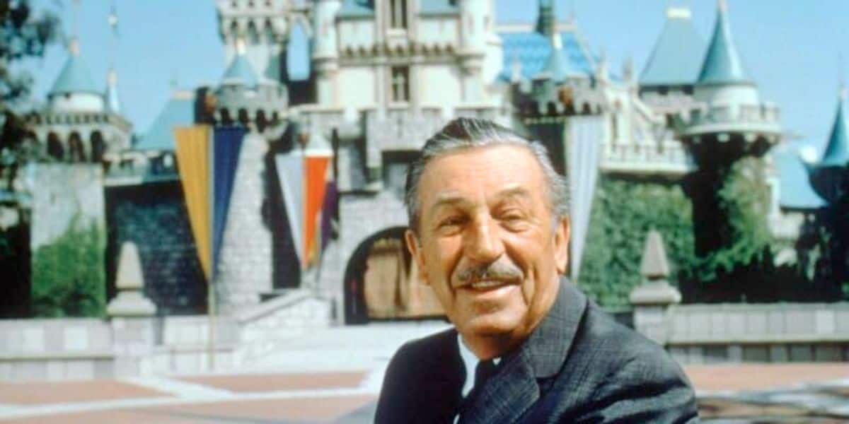 Walt Disney in front of Sleeping Beauty Castle