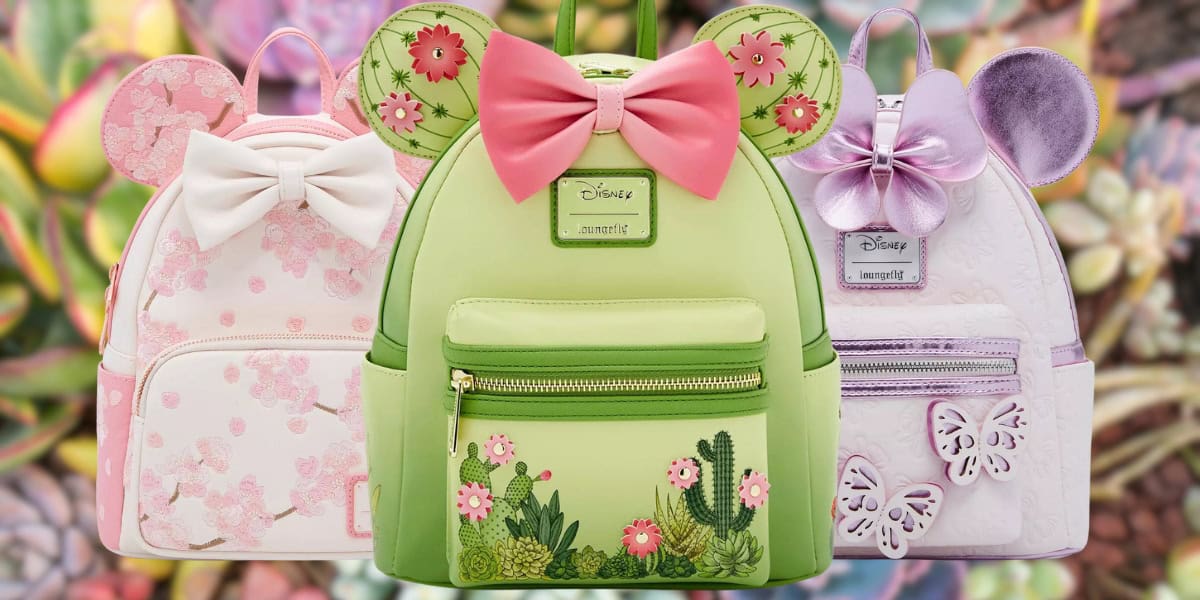 Three Disney-themed backpacks are displayed. One is green with floral embroidery and cactus motifs, featuring pink ears and bow. The others are pastel-colored with bows and ears, featuring floral and butterfly designs, set against a blurred floral background.