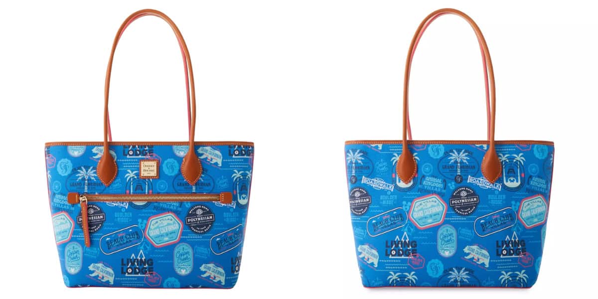 Two views of a blue tote bag featuring brown handles and vibrant travel-themed graphics, including palm trees and stamps. The front has a zippered pocket, while the back displays a seamless pattern.