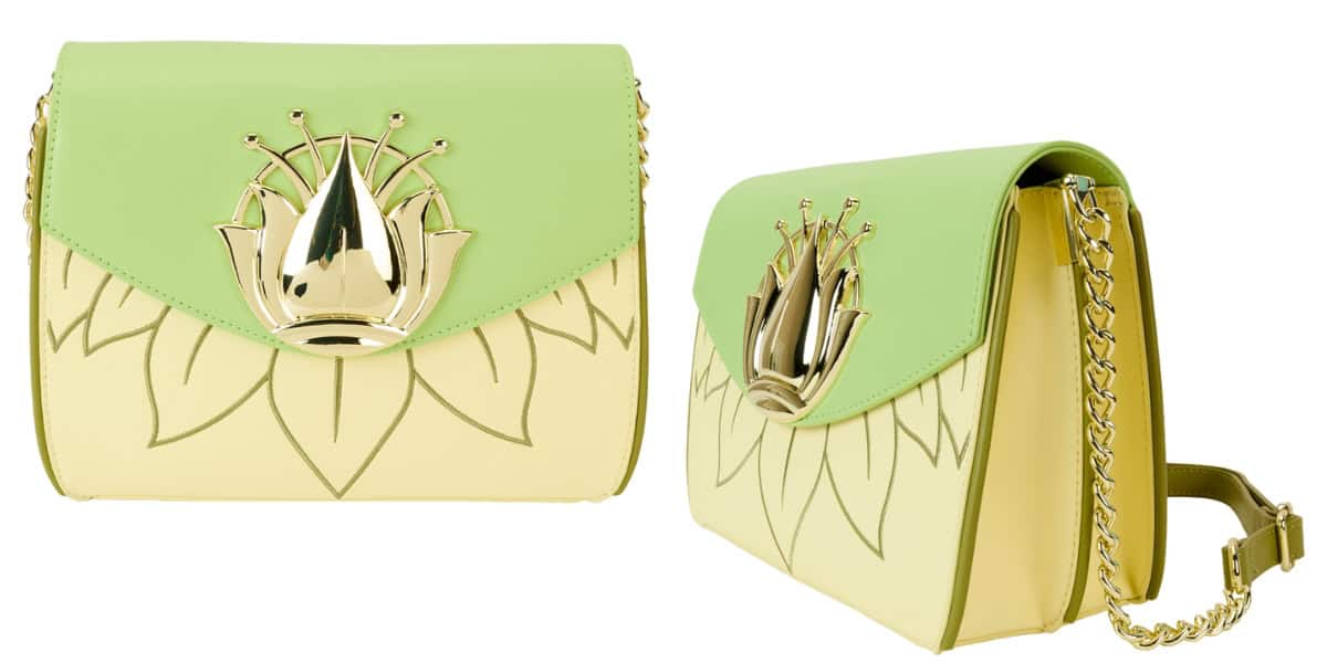 A stylish handbag with a pastel green flap and light yellow body. It features a gold lotus emblem and a gold chain strap. The lotus design is echoed in a subtle outline on the bag's surface.