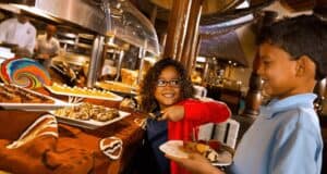 Two children at Boma Flavors of Africa Animal Kingdom Lodge