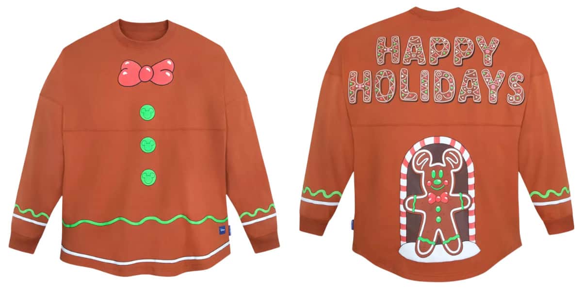 A festive long-sleeve shirt designed like a gingerbread cookie, featuring a bowtie, buttons, and swirly icing patterns. The back has the text "Happy Holidays" and a gingerbread man in a doorframe with candy cane borders.