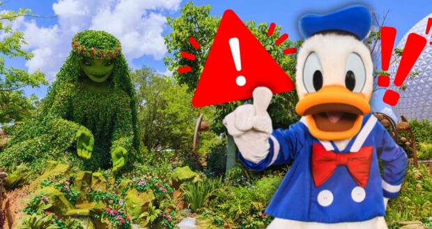 Donald Duck in his sailor outfit stands animatedly with a large red exclamation mark sign next to him. Behind him is a lush garden with a large plant sculpture of a lady surrounded by flowers and foliage. A geodesic dome structure is visible in the distance.