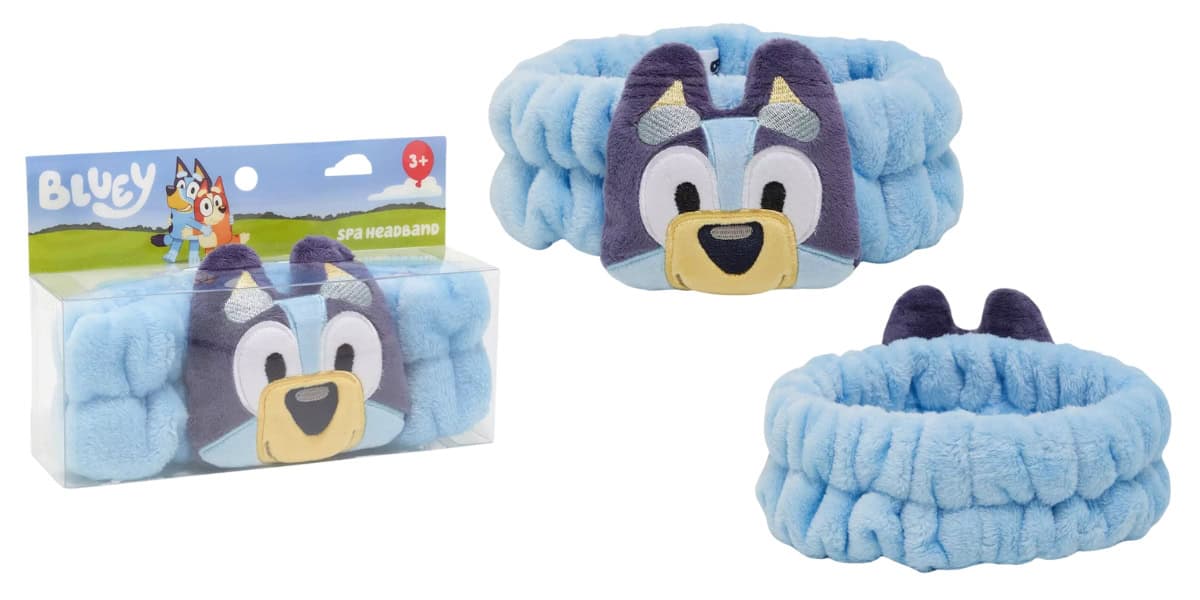 Bluey-themed spa headbands featuring Bluey's face in soft, light blue plush fabric. Includes one headband inside a packaging box and another displayed outside. Packaging features Bluey imagery and is labeled for ages 3 and up.